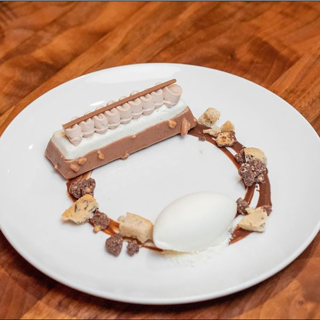 The latest dessert creation with Republica del Cacao chocolate cremeux, Madagascar vanilla bean, and white chocolate ice cream.
